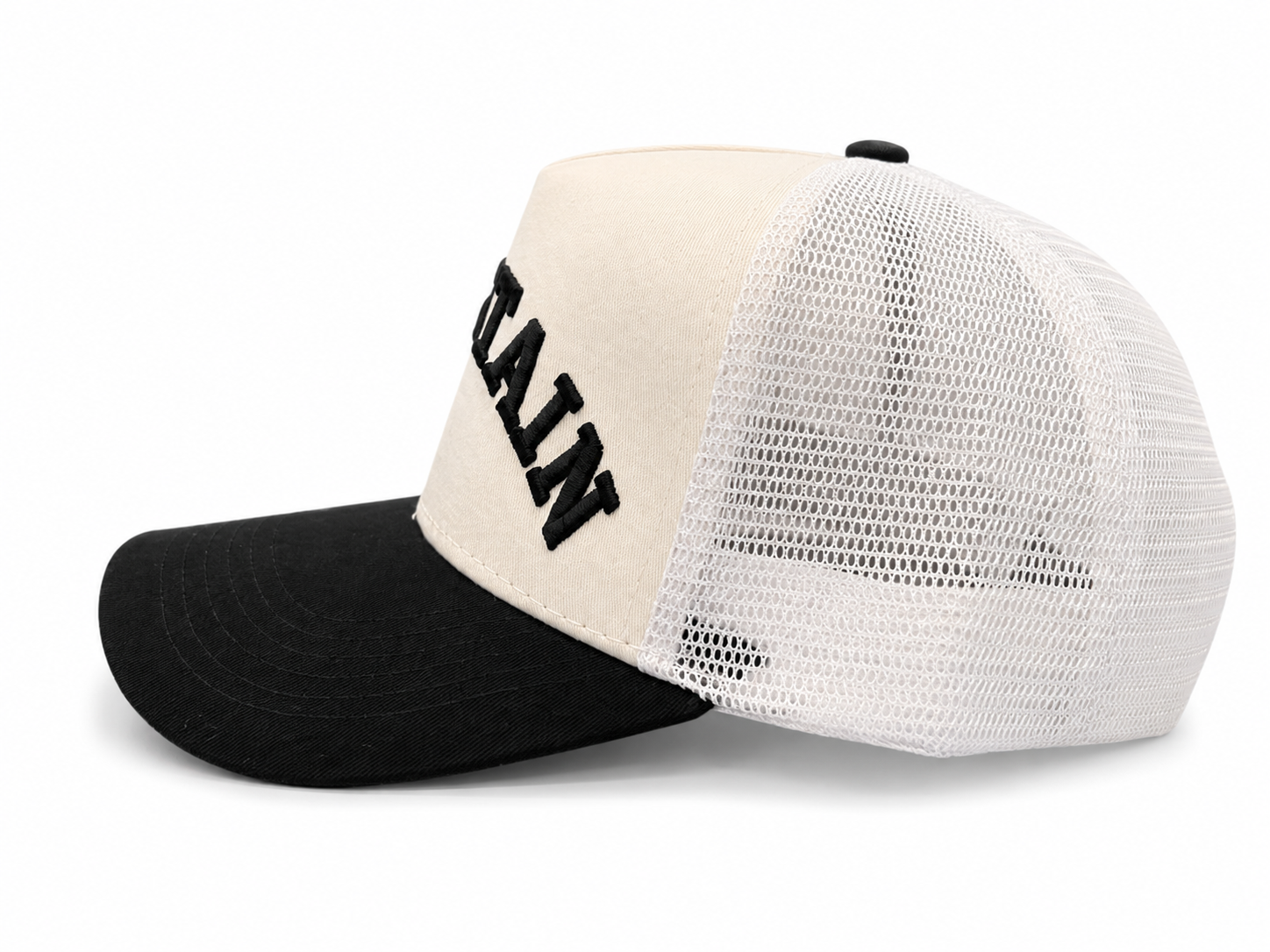 Chastain Trucker Black – side profile showing white mesh back and black brim
